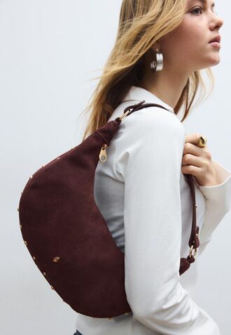 100 % skinn skulderveske med nitter