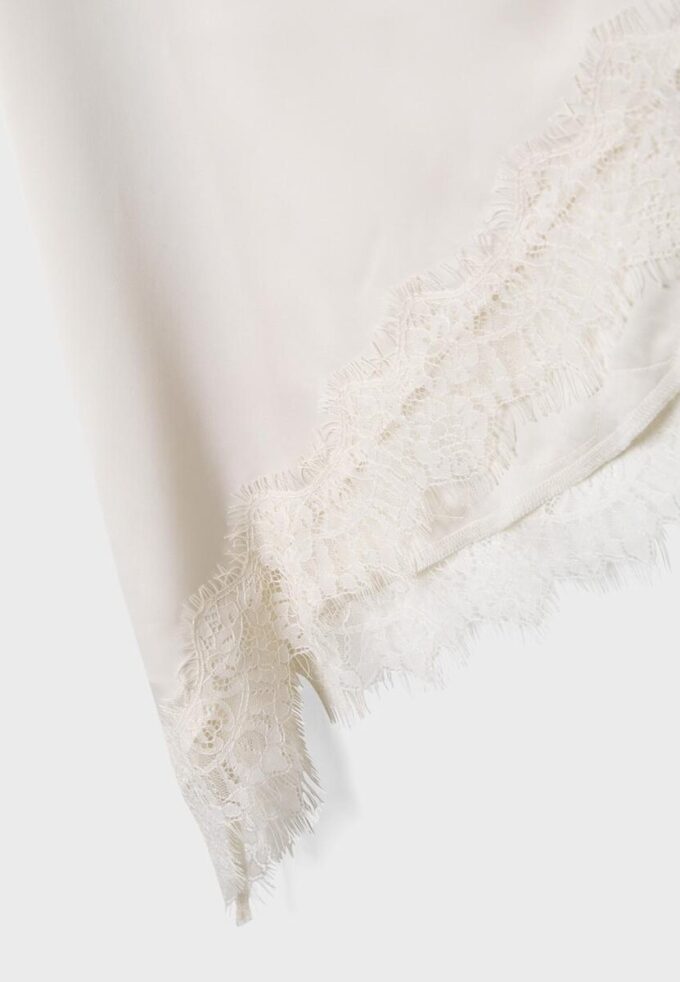 Asymmetrisk skjørt i sateng