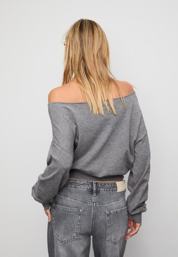 Asymmetrisk strikket genser