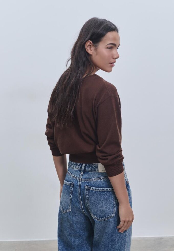 Asymmetrisk strikket genser