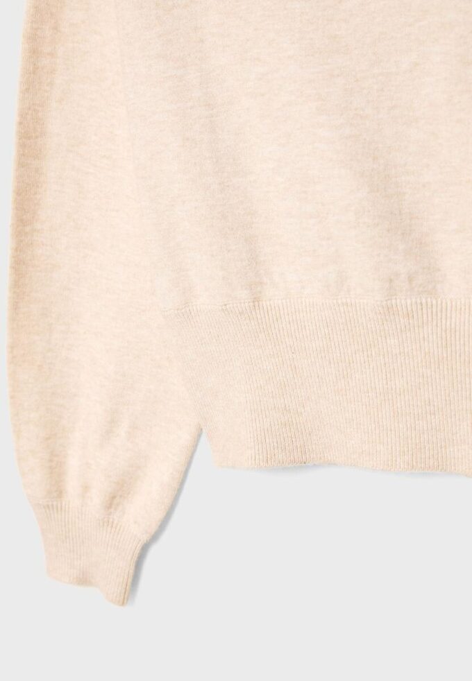 Asymmetrisk strikket genser