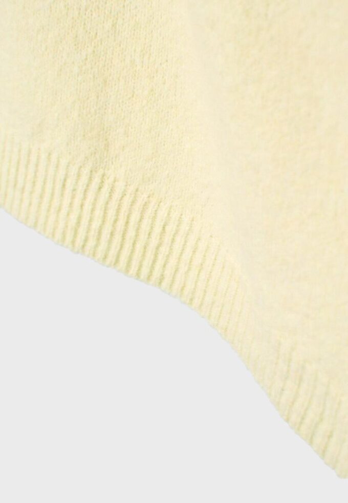 Asymmetrisk strikket genser