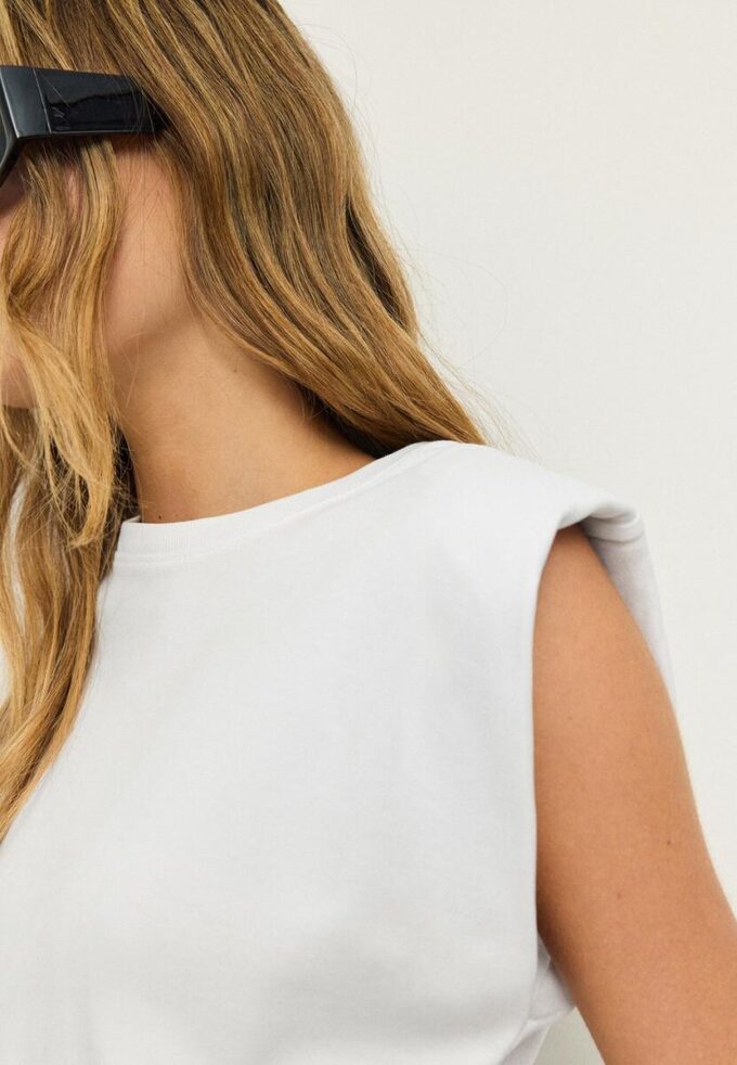 Basisplagg med polstrede skuldre