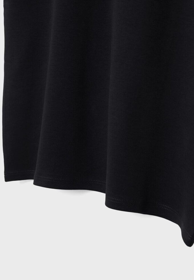 Basisplagg med polstrede skuldre