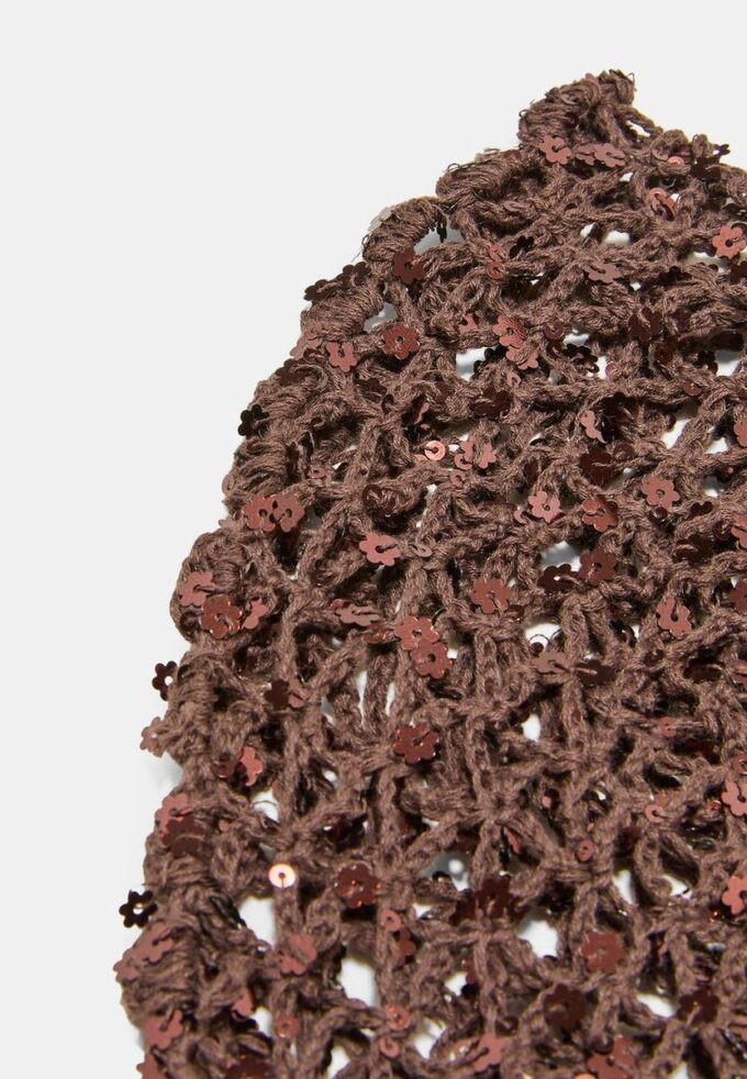 Blomsterlue med paljetter