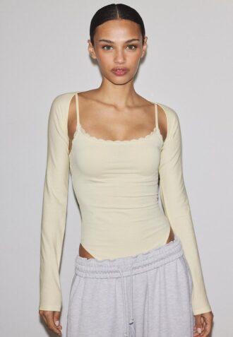 Bolero med lang erme og smal passform