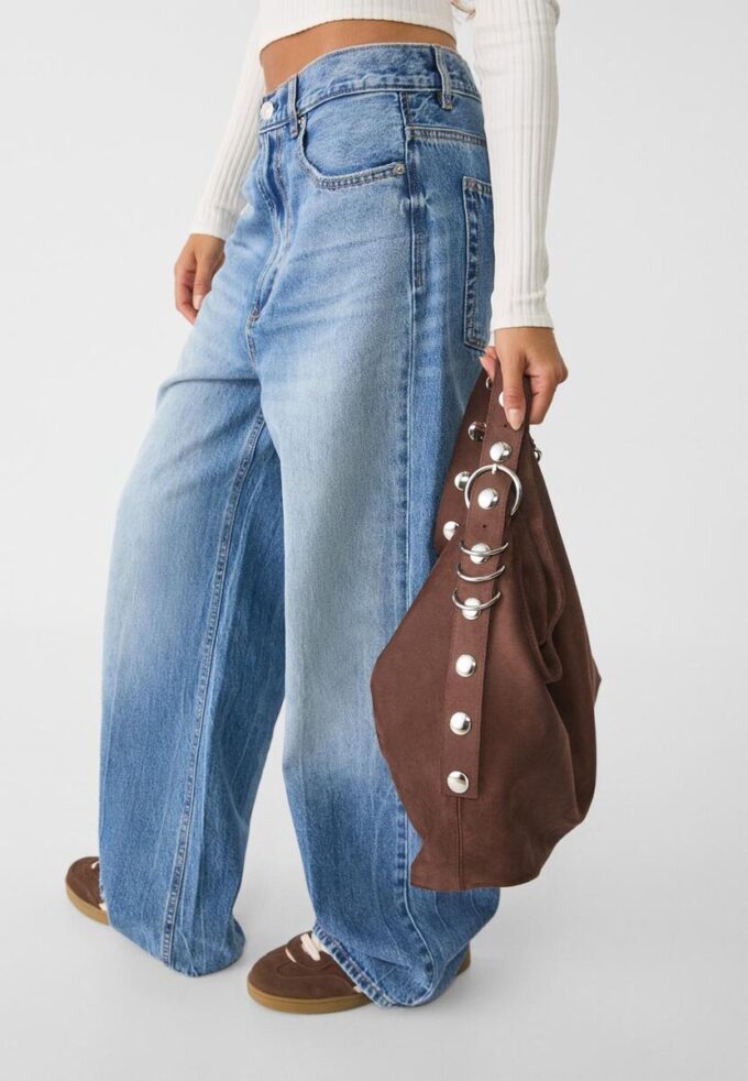 Bucket-veske i imitert semsket skinn med stroppdetaljer