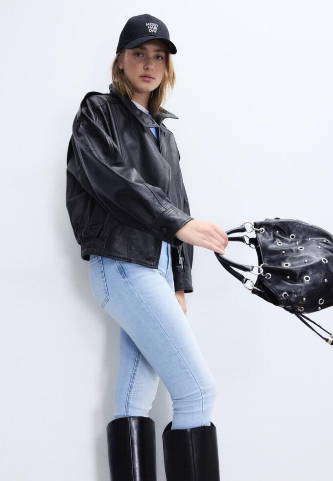 Bucket-veske med øye-detaljer