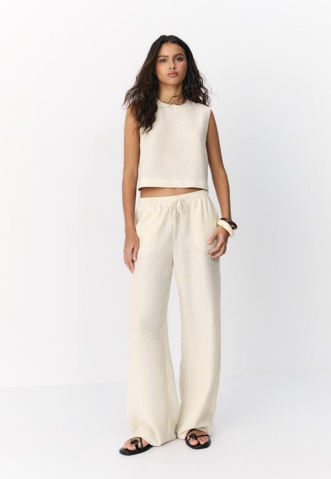 Bukser med flytende metalltråd og lin-effekt