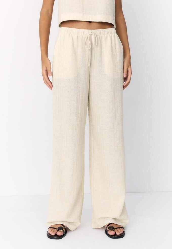 Bukser med flytende metalltråd og lin-effekt