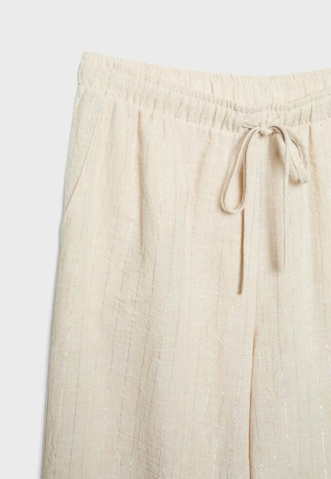 Bukser med flytende metalltråd og lin-effekt