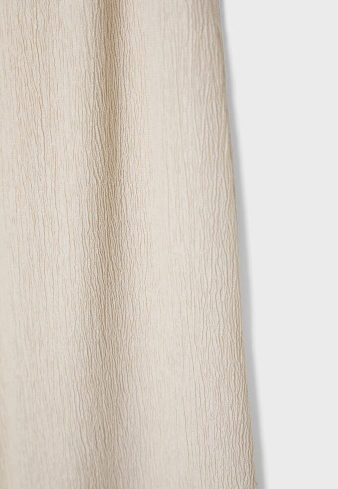 Bukser med rett ben og krøllet effekt