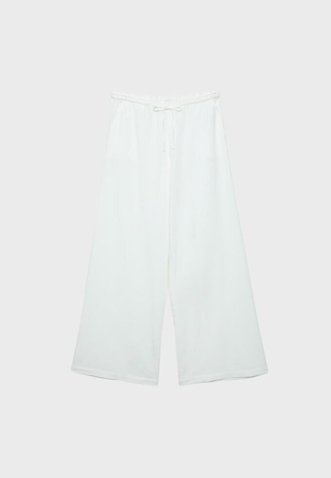 Bukser med vid ben og lin-effekt