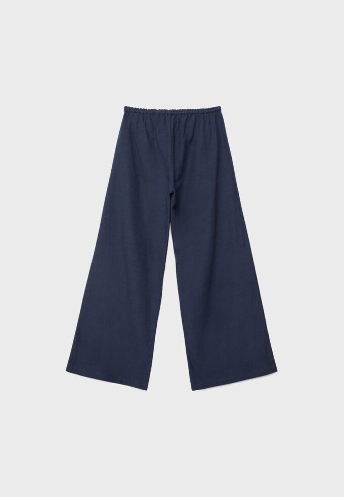 Bukser med vid ben og lin-effekt