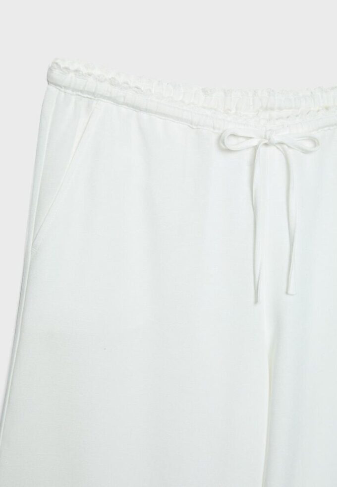 Bukser med vid ben og lin-effekt