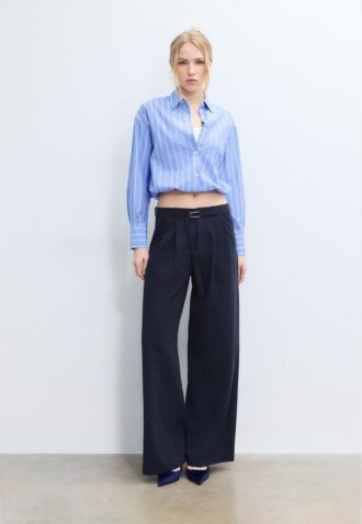 Bukser med vid ben og spennedetaljer