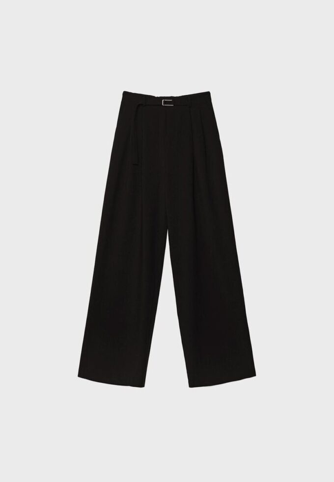 Bukser med vid ben og spennedetaljer