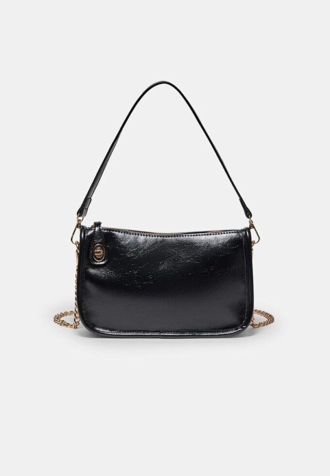 Crossbody-veske med flere bærestillinger
