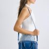 Crossbody-veske med glidelåsdetaljer