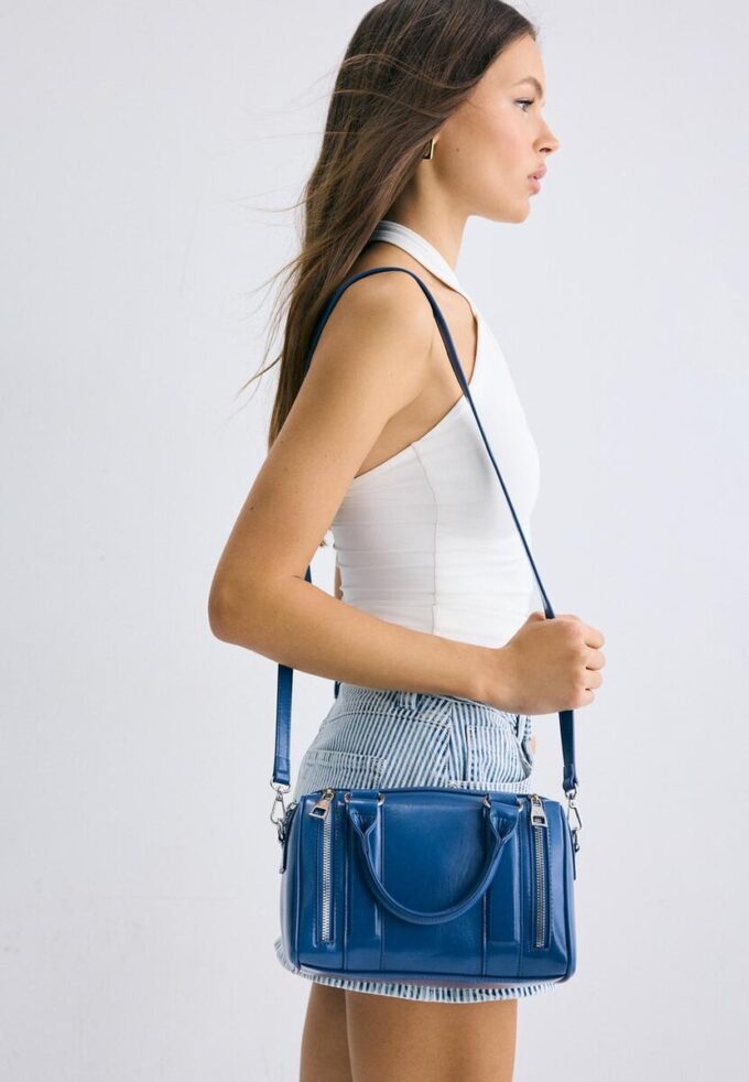 Crossbody-veske med glidelåsdetaljer