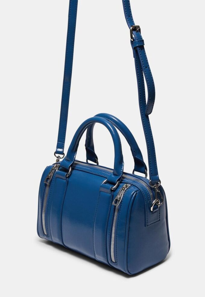 Crossbody-veske med glidelåsdetaljer