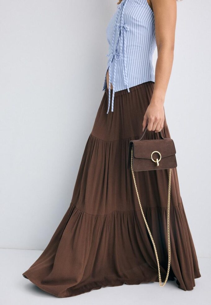 Crossbody-veske med rund lås