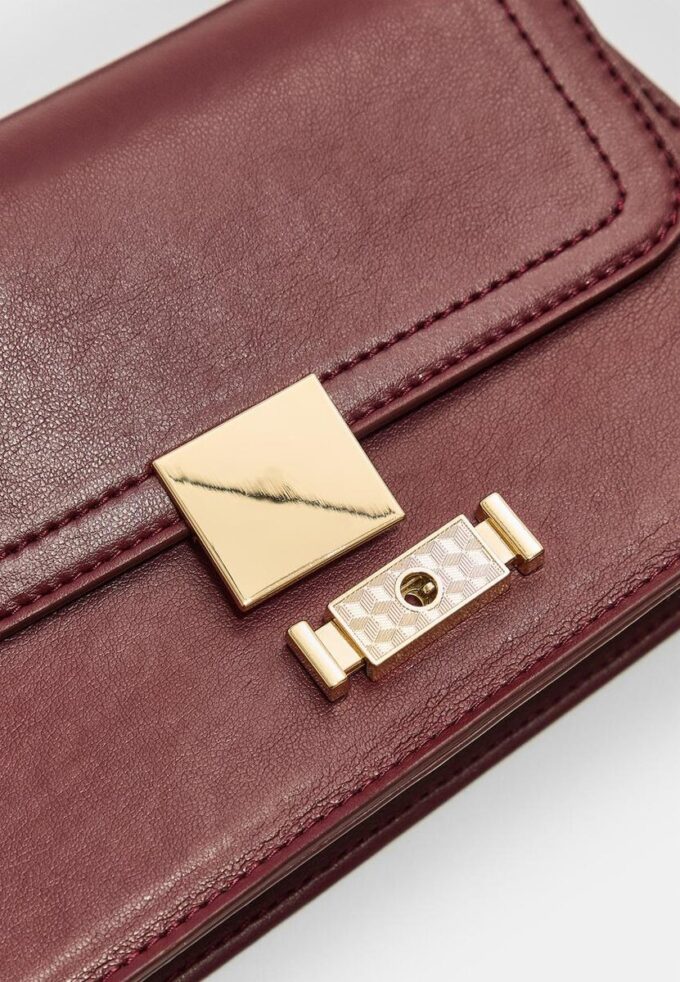 Crossbody-veske med to håndtak