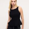 Ermeløs peplum-topper