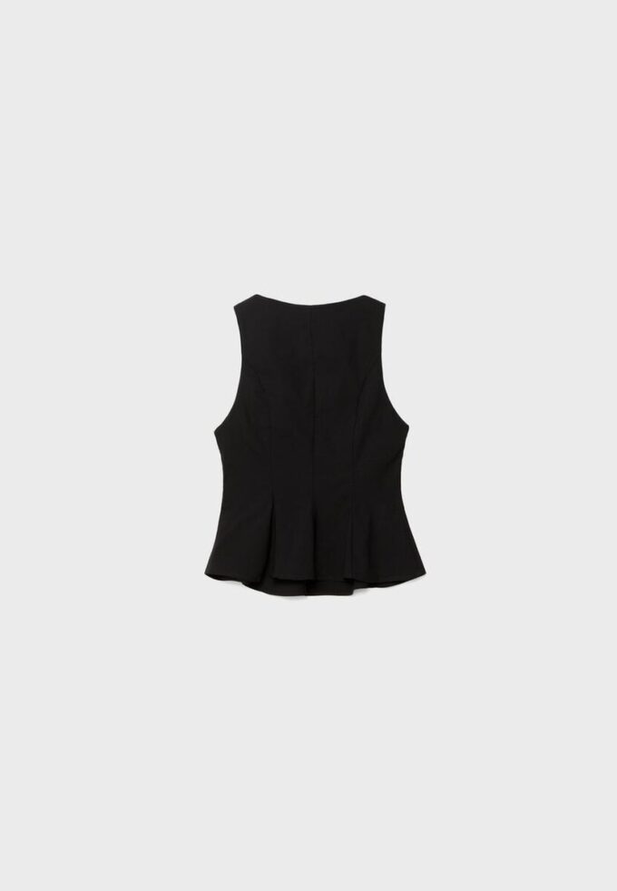 Ermeløs peplum-topper