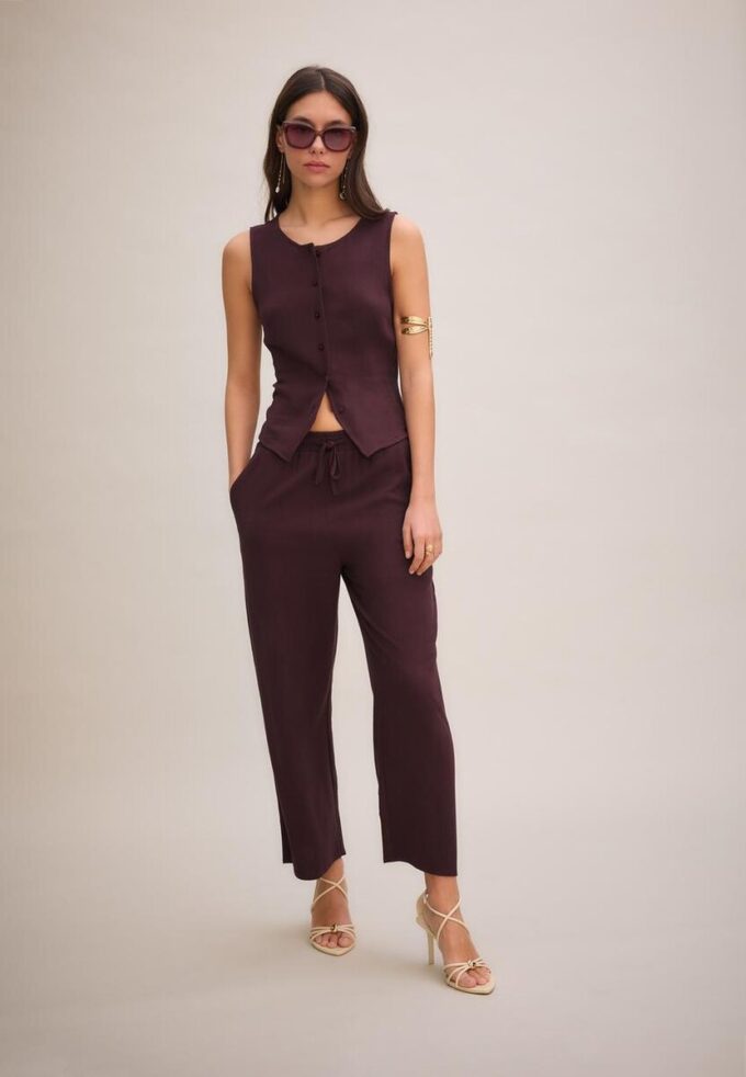 Ermeløs topp med knapper