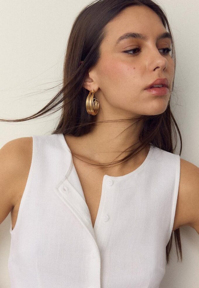 Ermeløs topp med knapper