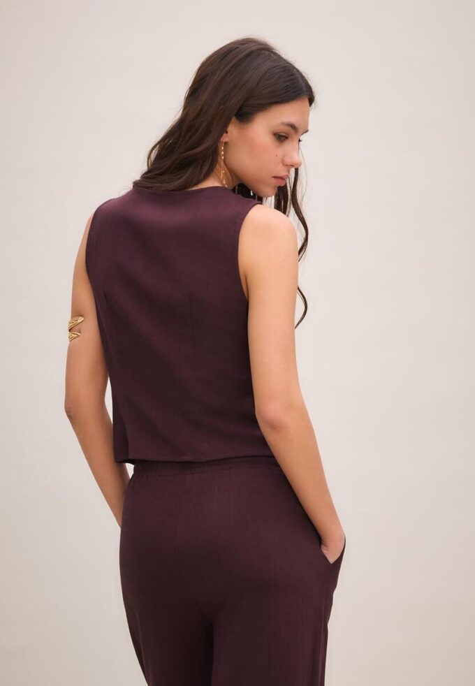 Ermeløs topp med knapper