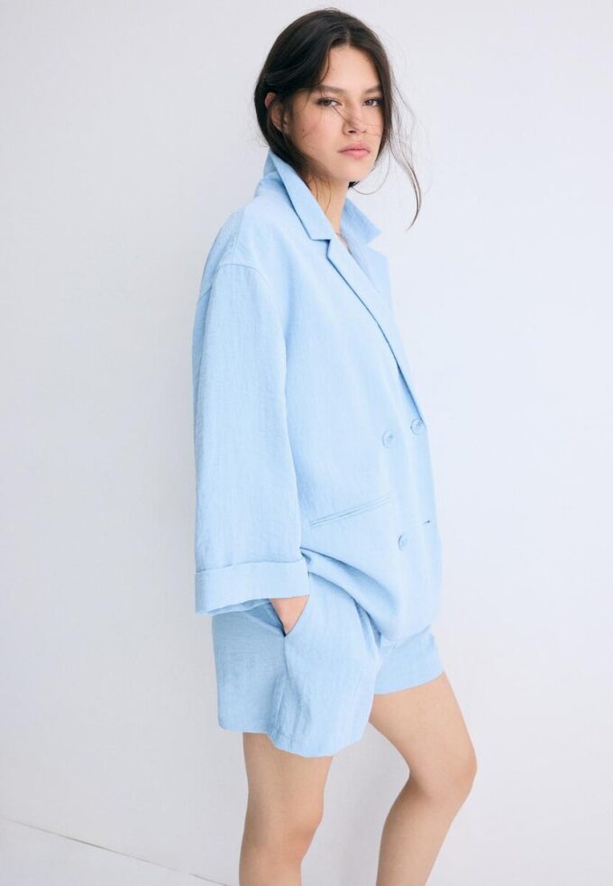 Flytende blazer med dobbel knappestolpe