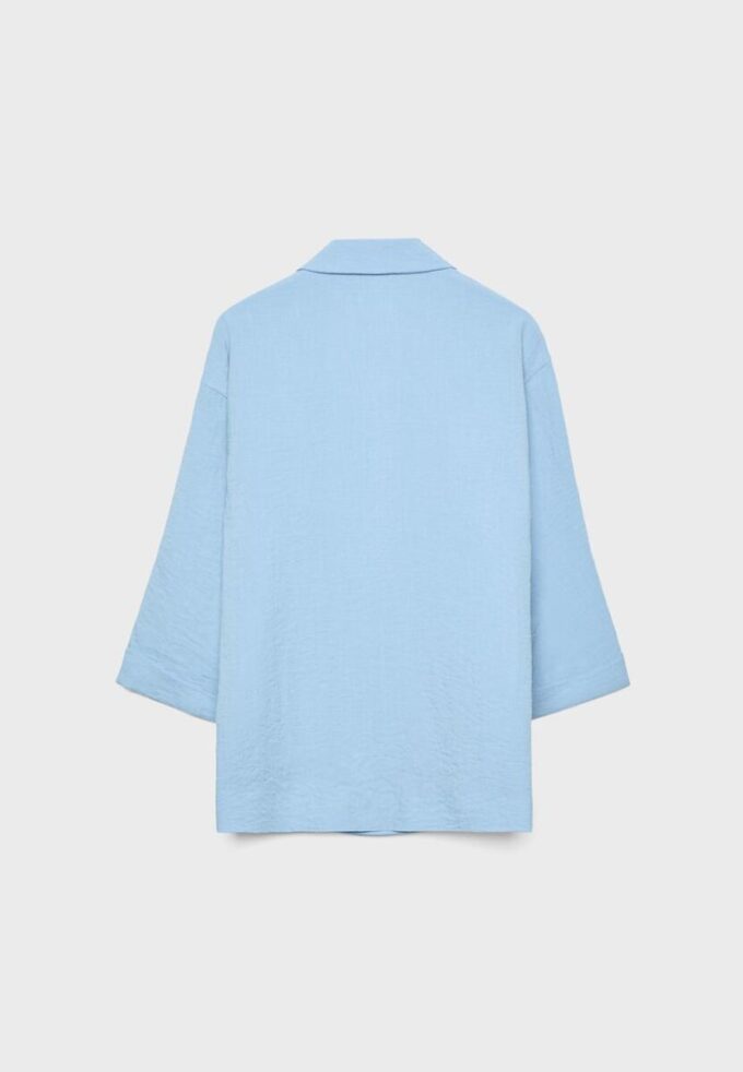 Flytende blazer med dobbel knappestolpe