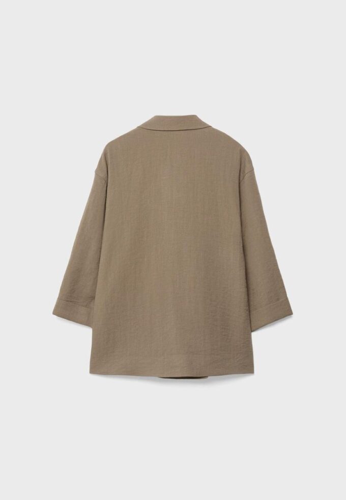 Flytende blazer med dobbel knappestolpe