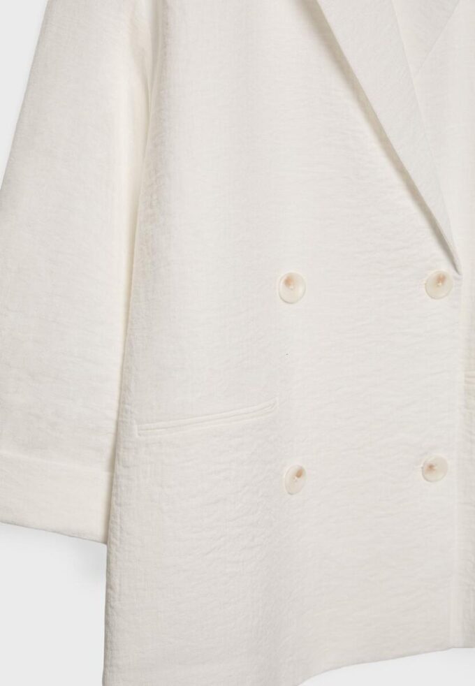 Flytende blazer med dobbel knappestolpe