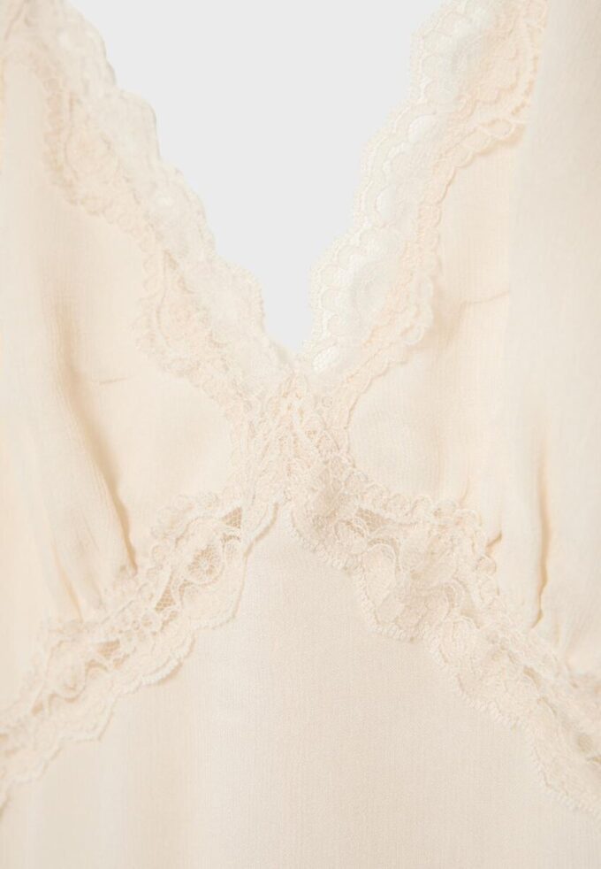 Haltertopper med blonder