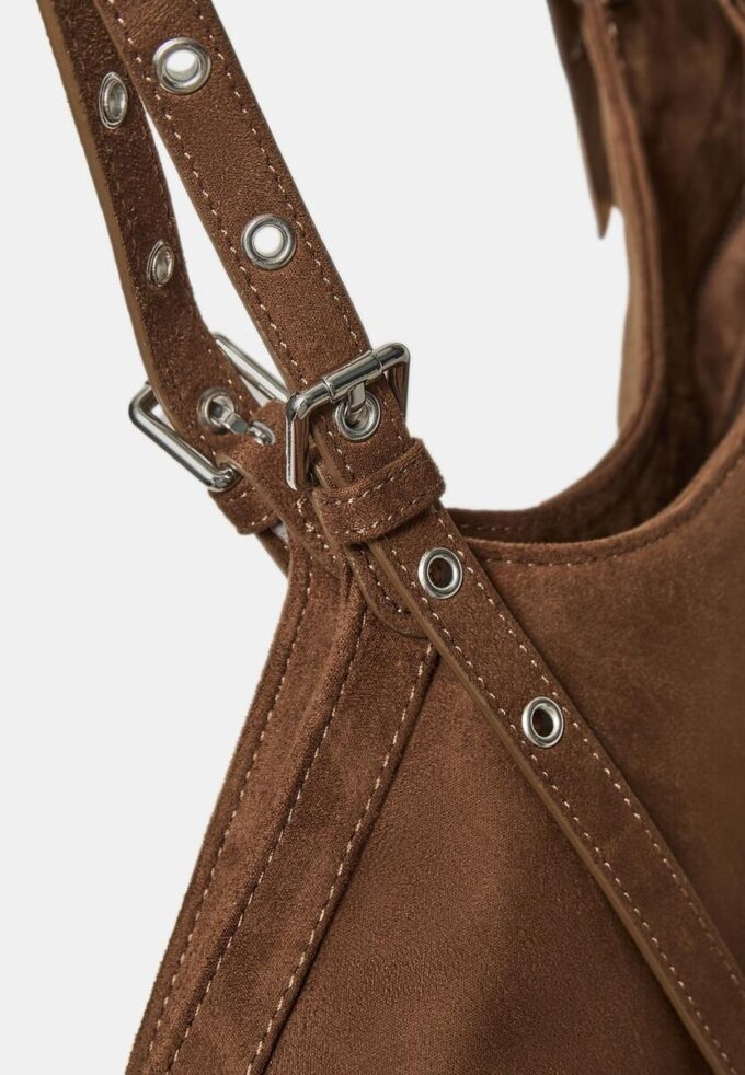 Handlepose med mini-spenne