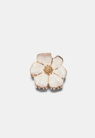 Hårspenne med metallblomst