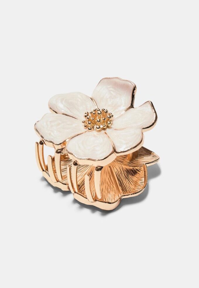 Hårspenne med metallblomst
