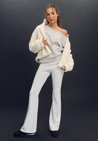 Jakke med glidelås og fôr i imitert saueskinn