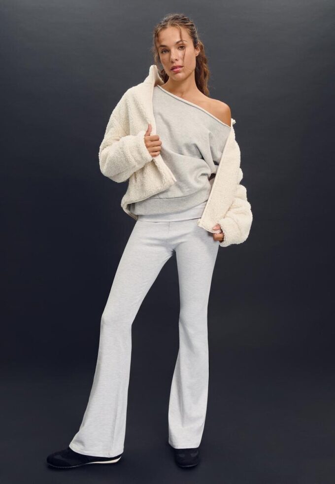 Jakke med glidelås og fôr i imitert saueskinn