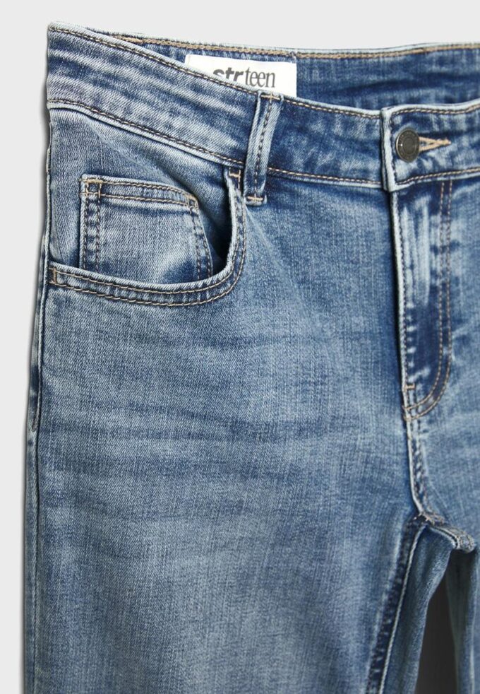 Jeans med lav midje og klokkebunn