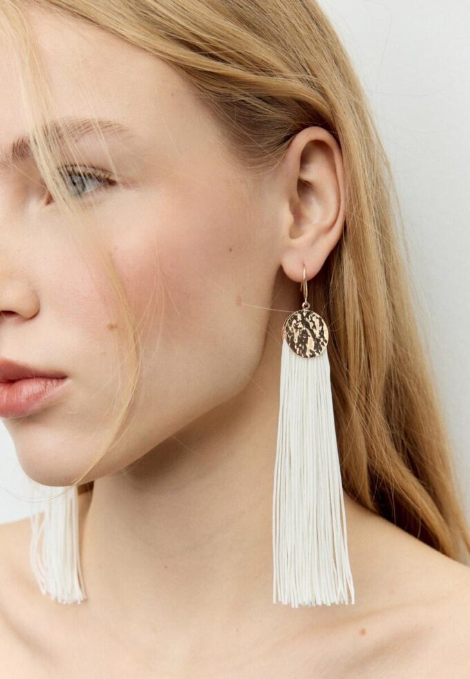 Lange frynseøreringer