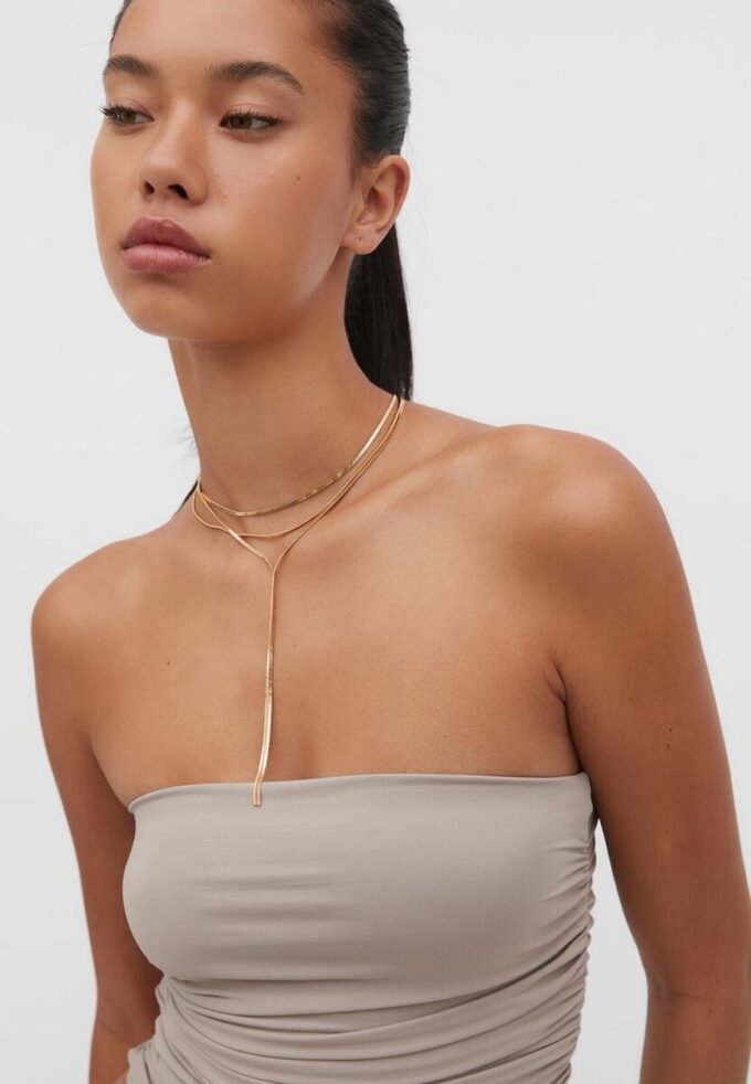 Langt halskjede med flere kjeder