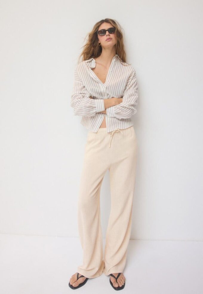 Løse bukser med lin-effekt