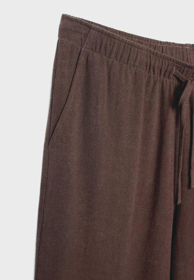 Løse bukser med lin-effekt