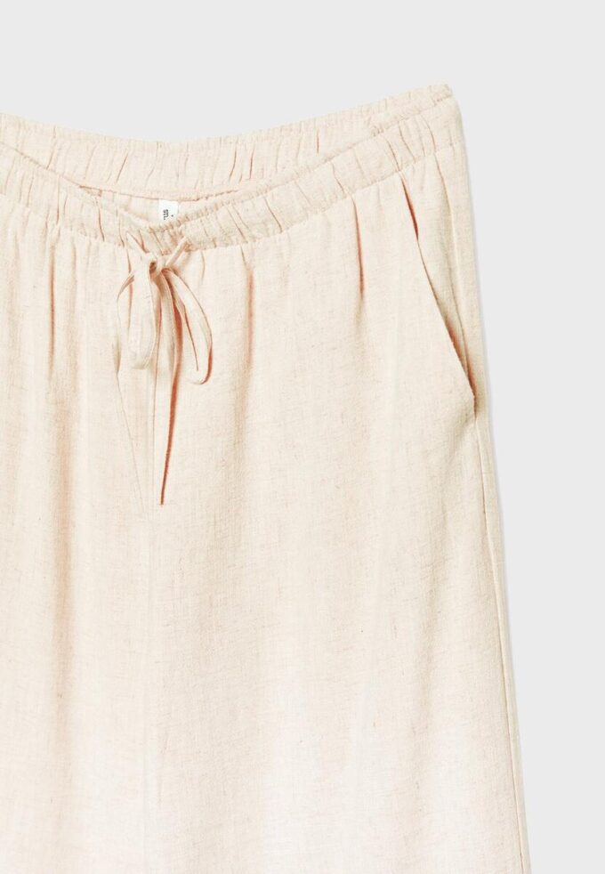 Løse bukser med lin-effekt