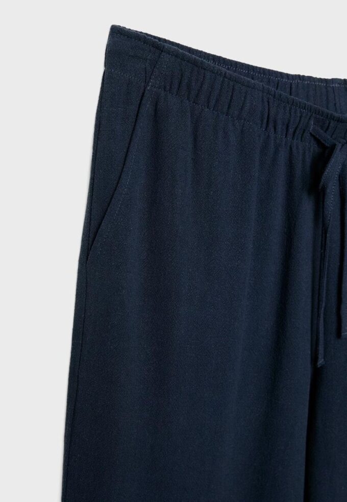 Løse bukser med lin-effekt