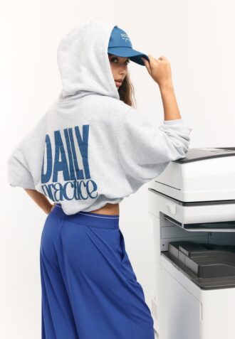 Mønstret bomber-sweatshirt med hette og trykk